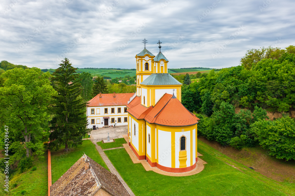 Aerial view of Church of St. Michael and Archangel Gabriel in Graboc, Hungary.