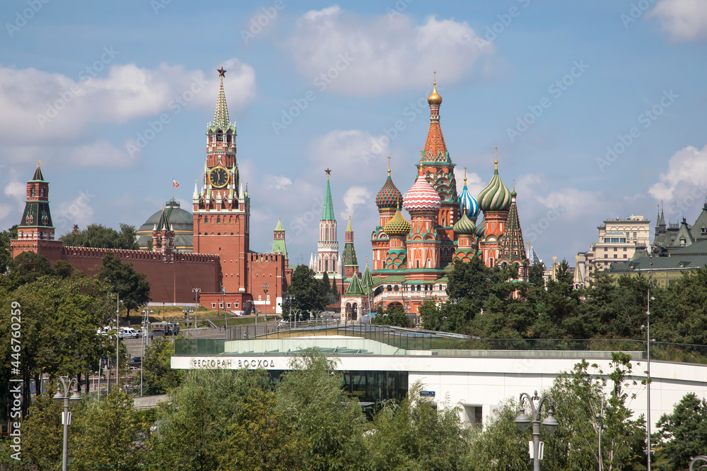 Beautiful Moscow Kremlin on the river bank. High towers. Sunny day. Ancient architecture. Center of Moscow.