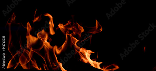 The fire. Flames. Banner, abstract background, wallpaper. Yellow and orange flames.