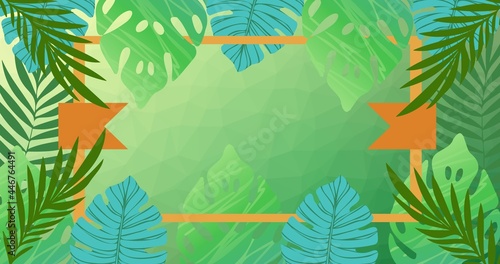 Composition of exotic leaves forming frame with copy space on green background