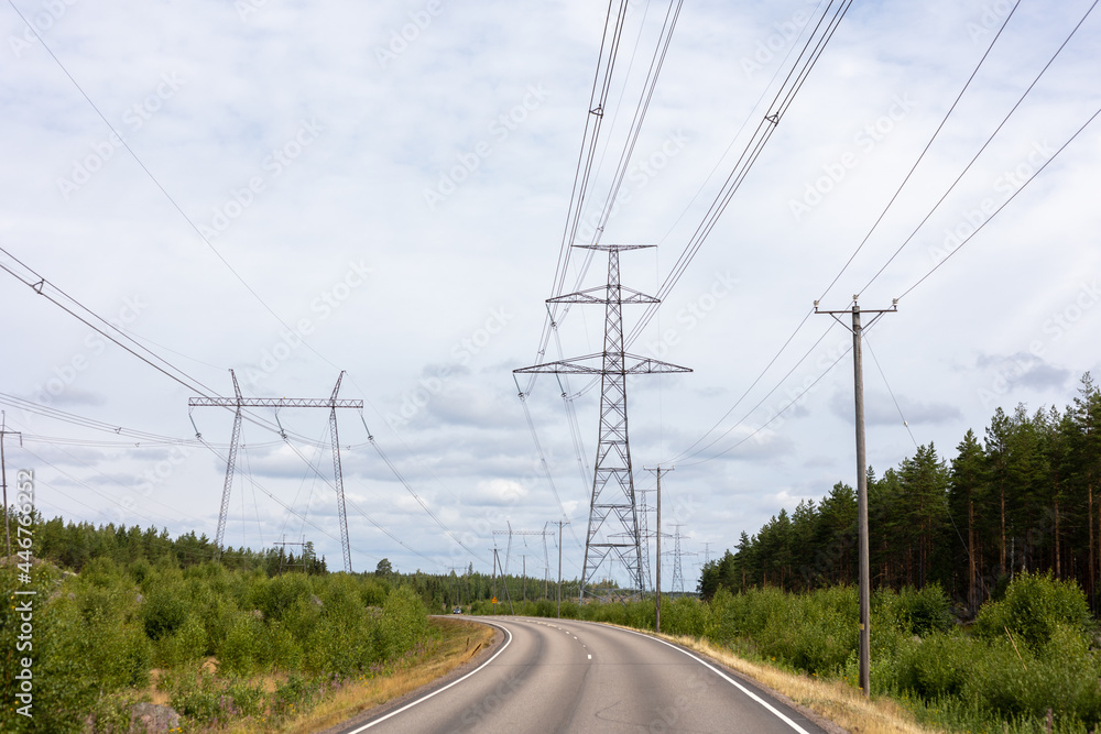 High voltage power lines over a road
