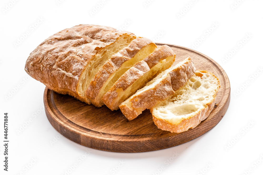 Fresh bread ciabatta loaf close up. Bakery background Fresh bread ciabatta loaf close up. Bakery background