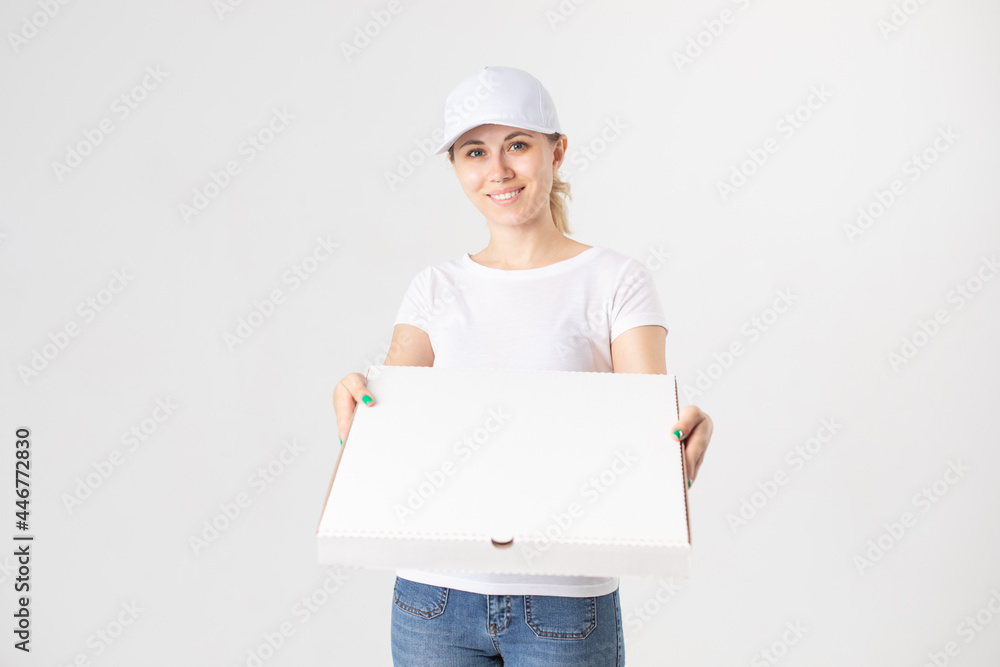 Female delivery woman in white uniform holding white boxes of pizza. Mock-up. Female delivery woman in white uniform holding white boxes of pizza. Mock-up.