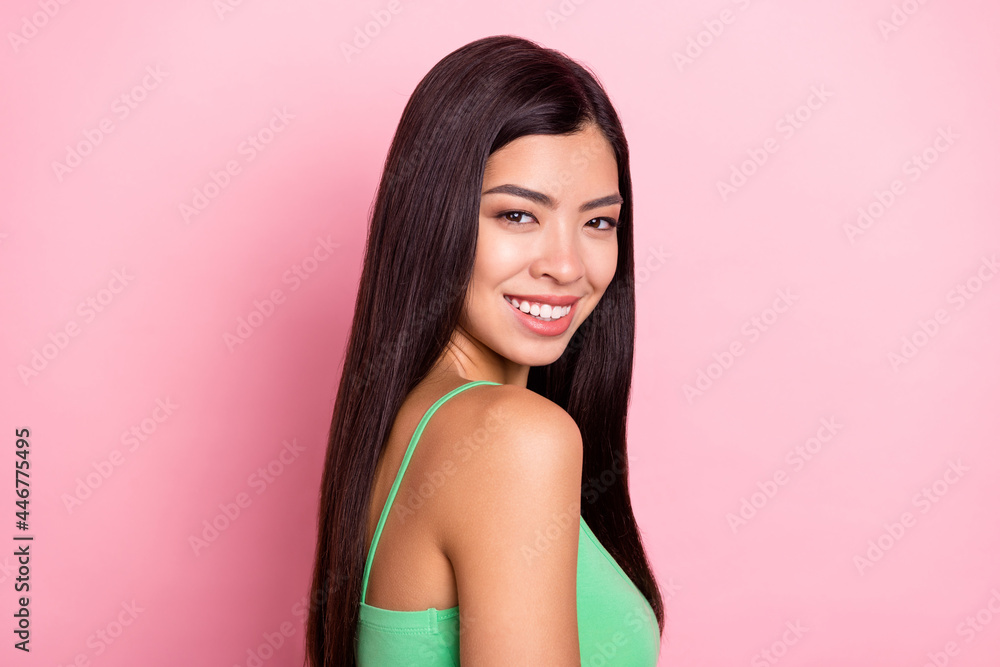 Photo of cute adorable young lady wear green tank-top smiling isolated pink color background Photo of cute adorable young lady wear green tank-top smiling isolated pink color background