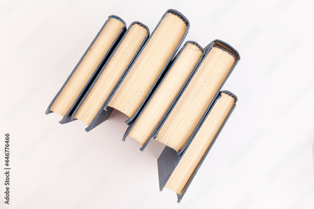 Old hardback books background. Top view. education background. Back to school. Copy space for text. Old hardback books background. Top view. education background. Back to school. Copy space for text.