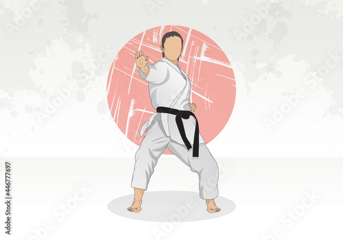 A female athlete conducts karate training, she has a black belt in karate.