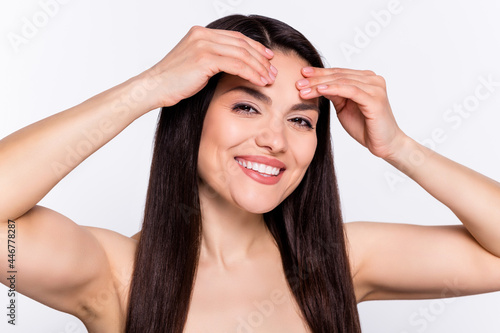 Photo portrait brunette woman smiling got wrinkles on forehead need anti-age cream isolated white color background