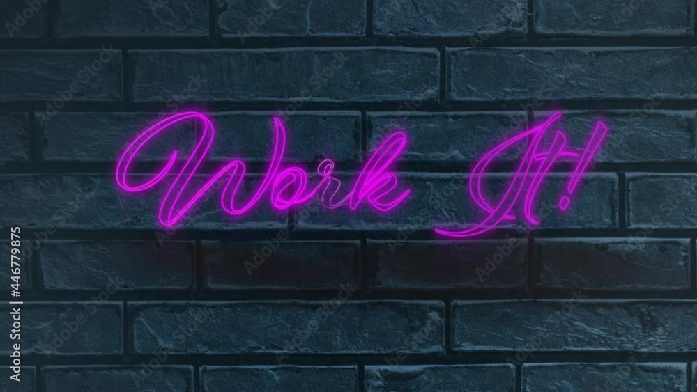 Neon purple work it text against grey brick wall in background Neon purple work it text against grey brick wall in background