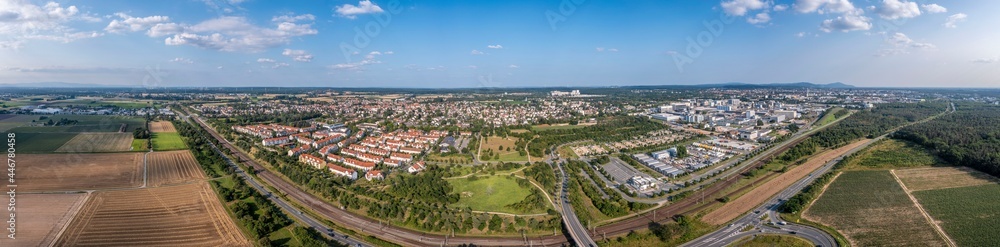 Drone panorama of the city of Darmstadt in southern Hesse with the suburb of Arheiligen taken in the evening