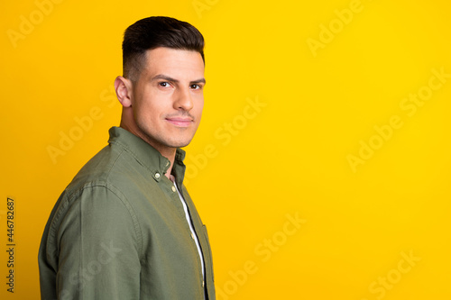 Photo portrait man wearing casual outfit smiling isolated vivid yellow color background blank space