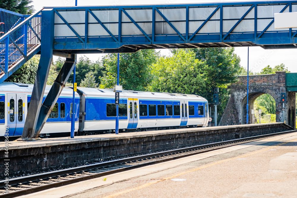 Naklejka premium Passenger Diesel powered Train at platform England UK