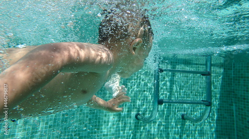 person swimming in the pool