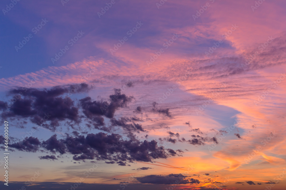 Fototapeta premium Colorful sunset with clouds in the evening
