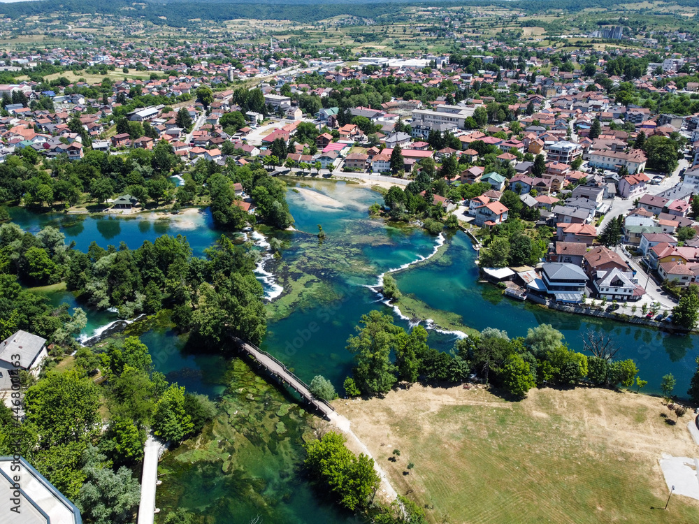 Aerial drone view Bihac and Una river in Bosnia and Herzegovina. Buildings, streets and residential houses. Bihać is a town and municipality in western BiH.