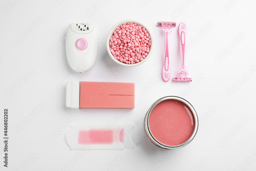 Set of epilation products on light background, flat lay Set of epilation products on light background, flat lay