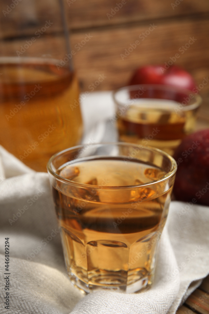 Glass of delicious apple cider on table. Space for text Glass of delicious apple cider on table. Space for text