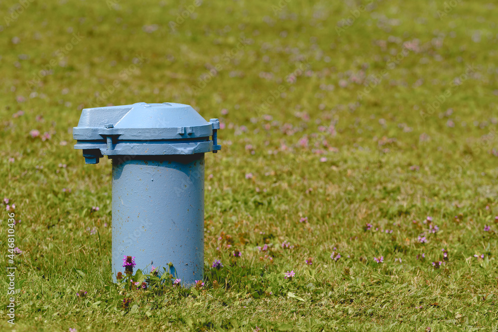 Fotografie Blue water well pipe and cap.