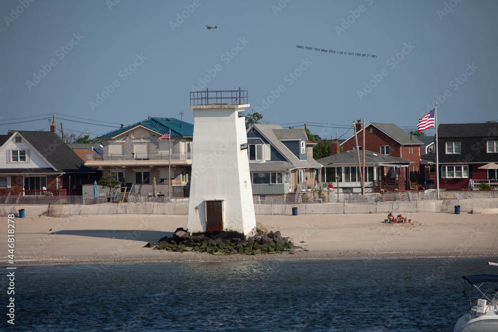 small lighthouse on beach