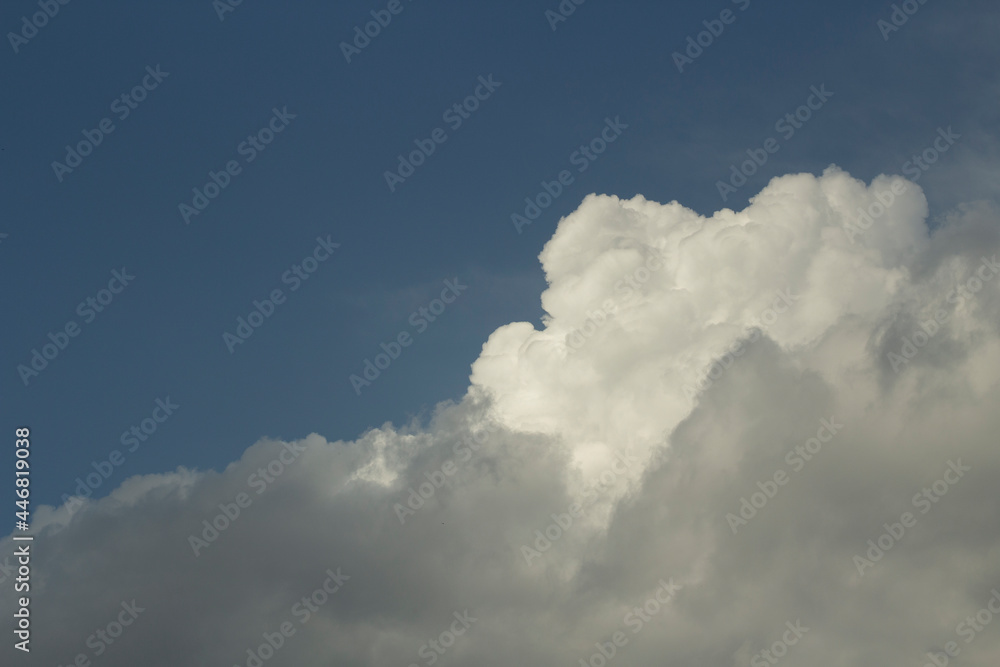 Clouds in the sky. White cumulus cloud close up. Clouds in the sky. White cumulus cloud close up.