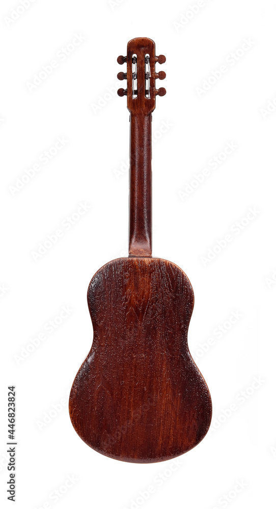 Naklejka premium Souvenir guitar with golden ornamented isolated on white background