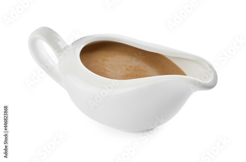 Fotografija Delicious turkey gravy in sauce boat isolated on white