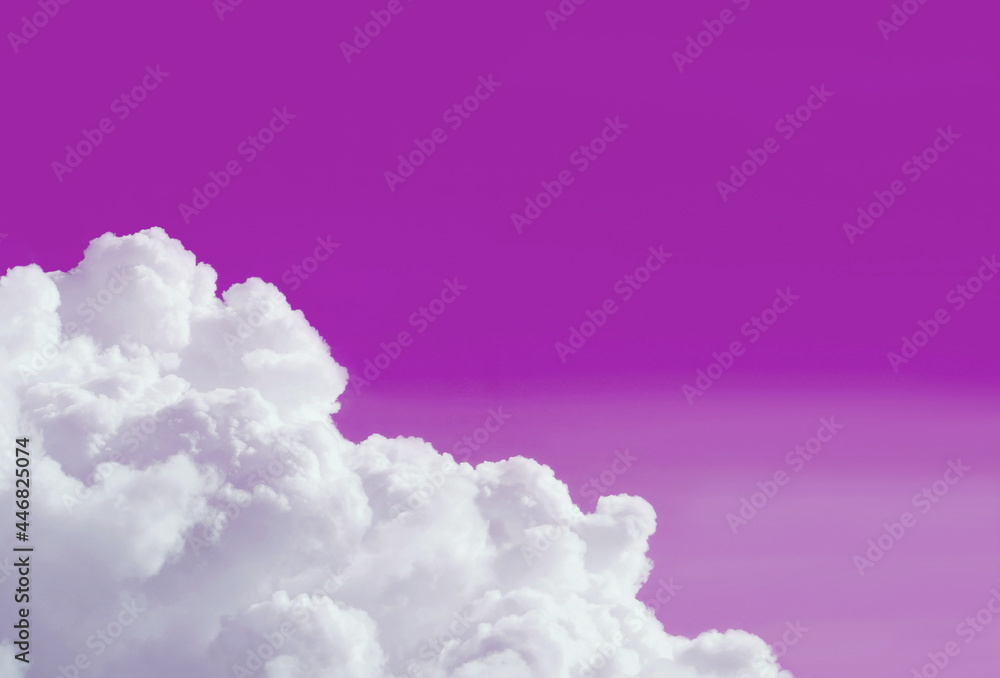 Pop art surreal style pure white fluffy clouds on gradient purple colored sky with copy space