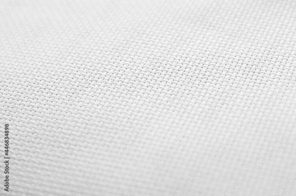 White canvas fabric, abstract background. White canvas fabric, abstract background.