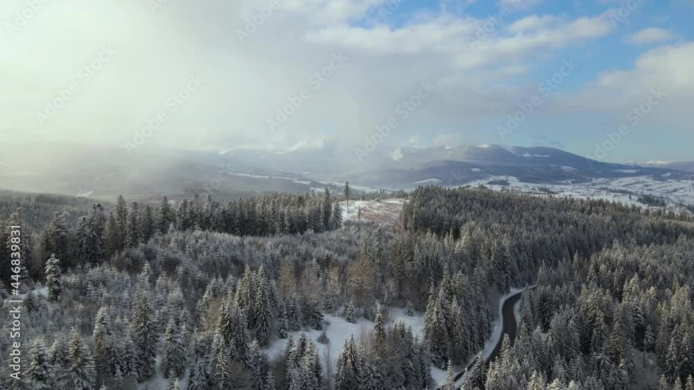 Aerial winter landscape with spruse trees of snow covered forest in cold mountains. Aerial winter landscape with spruse trees of snow covered forest in cold mountains.