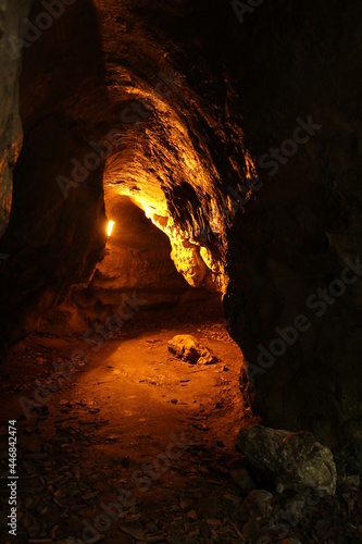 Cave with orange lights in Zugarramurdi
