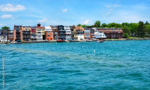 Shops, Restaurants and Condominium on Skaneateles Lake, view from the pier. The lake is one of Finger Lakes, and one of the cleanest in the world. Cityscape of Skaneateles, New York. 