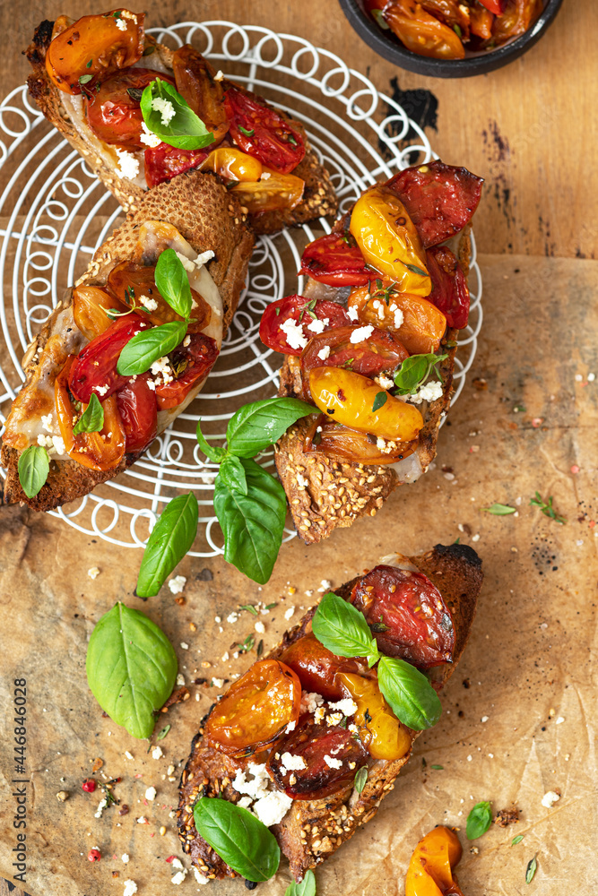 Bruschetta with mozzarella cheese and sun-dried tomatoes Bruschetta with mozzarella cheese and sun-dried tomatoes