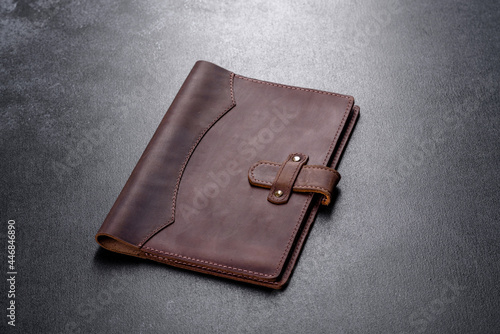 Beautiful leather brown case made of leather designed for a notebook