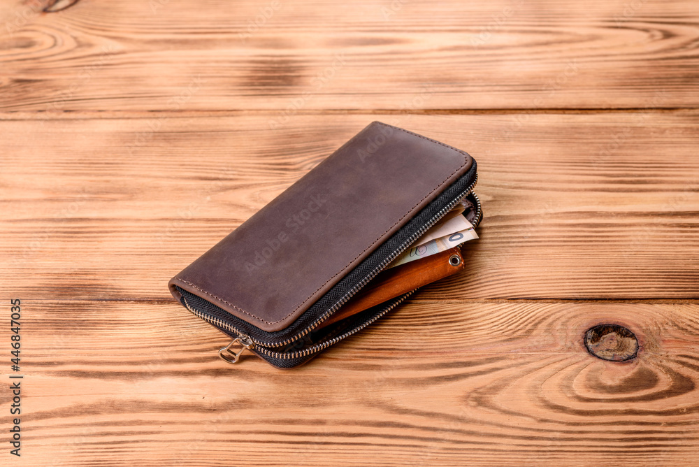 Beautiful leather brown purse made of leather to store paper money Beautiful leather brown purse made of leather to store paper money
