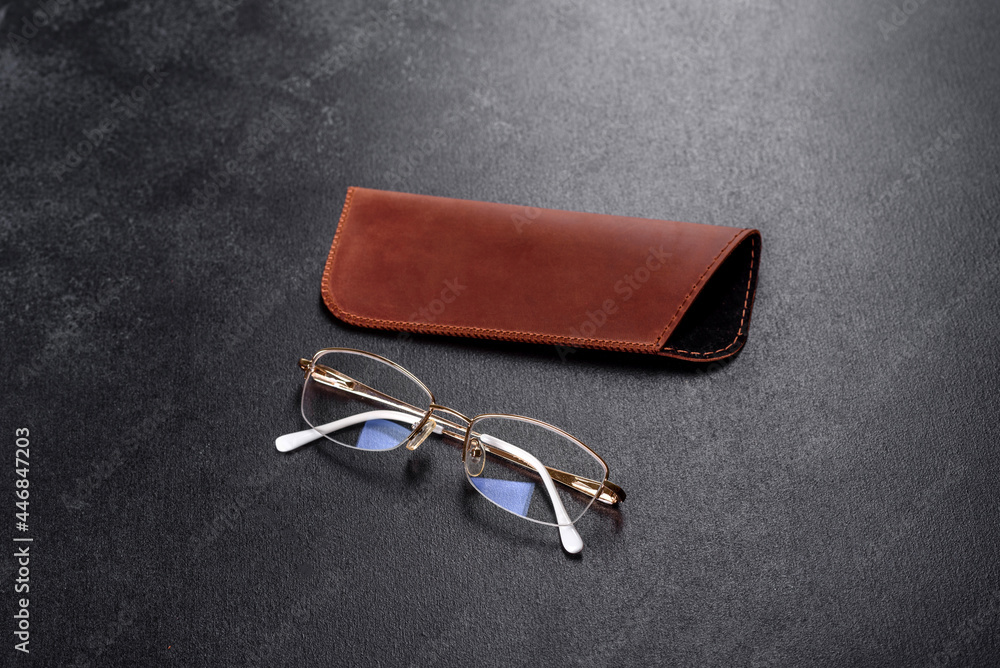 Beautiful brown case made of leather designed to store glasses
