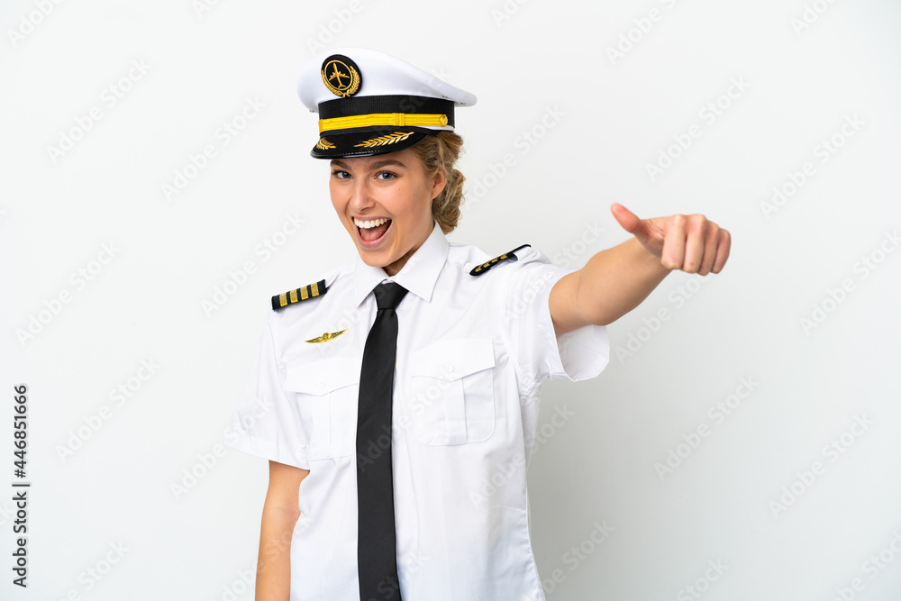 Airplane blonde woman pilot isolated on white background giving a thumbs up gesture