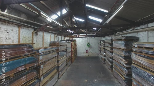 Warehouse with variety of wood for construction and repair. Wood Flooring Factory Production Line photo