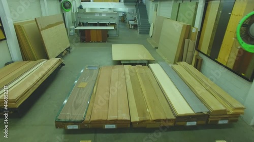 Warehouse with variety of wood for construction and repair. Wood Flooring Factory Production Line