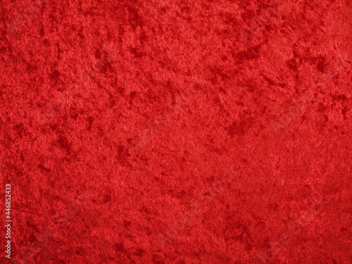 Closeup of red velvet cloth background photo