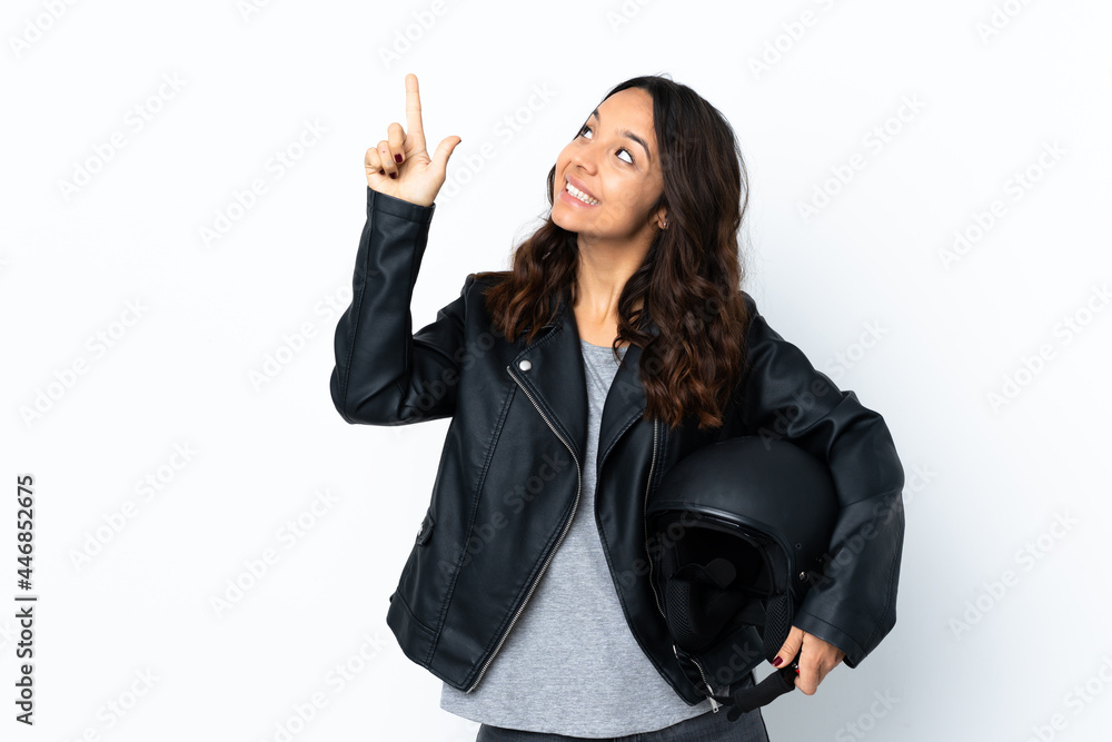 Young woman holding a motorcycle helmet over isolated white background pointing with the index finger a great idea Young woman holding a motorcycle helmet over isolated white background pointing with the index finger a great idea