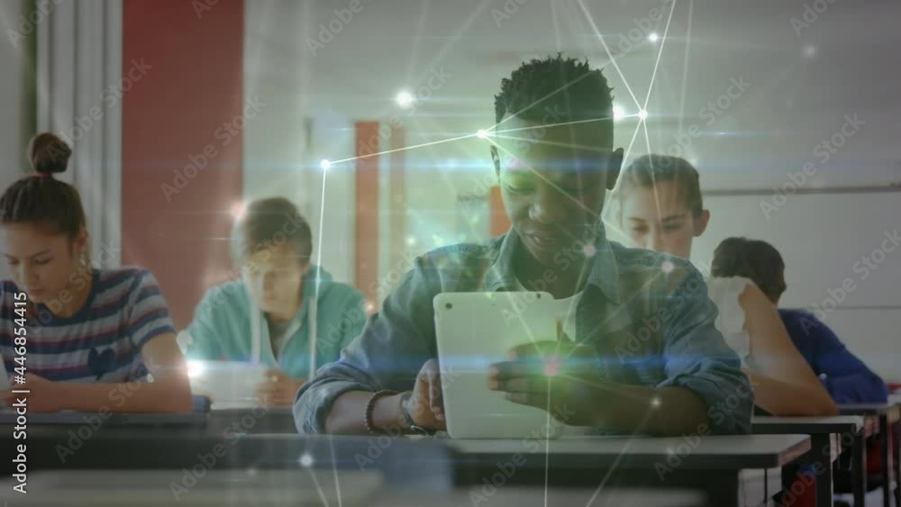 Animation of network of connections over student using tablet Animation of network of connections over student using tablet