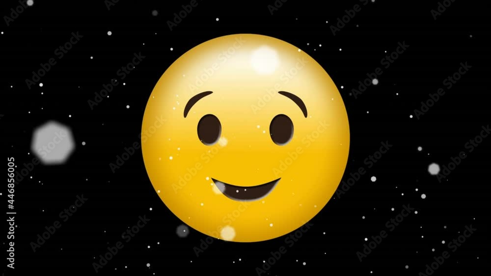 Digital animation of white particles floating against winking face emoji on black background Digital animation of white particles floating against winking face emoji on black background