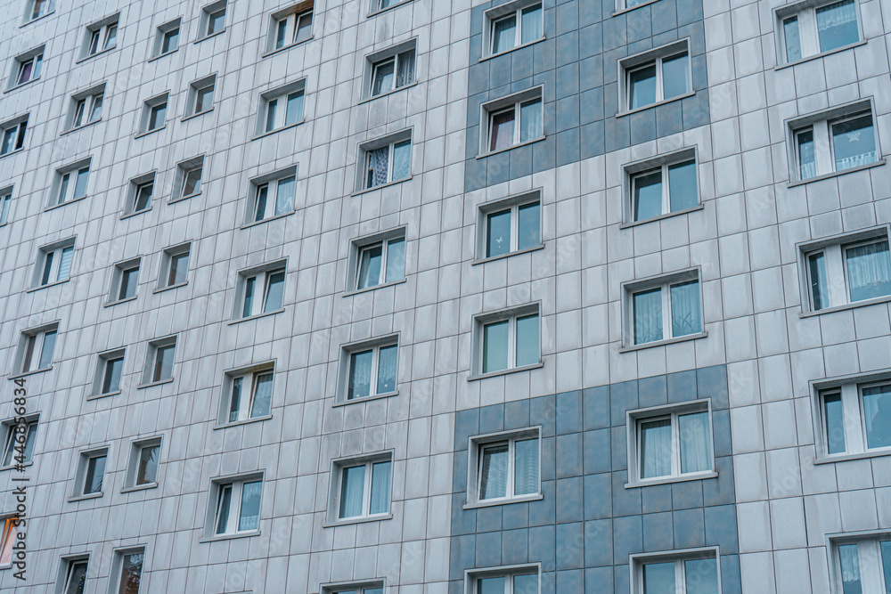 grey plattenbau building facade in detailed view