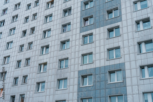 grey plattenbau building facade in detailed view