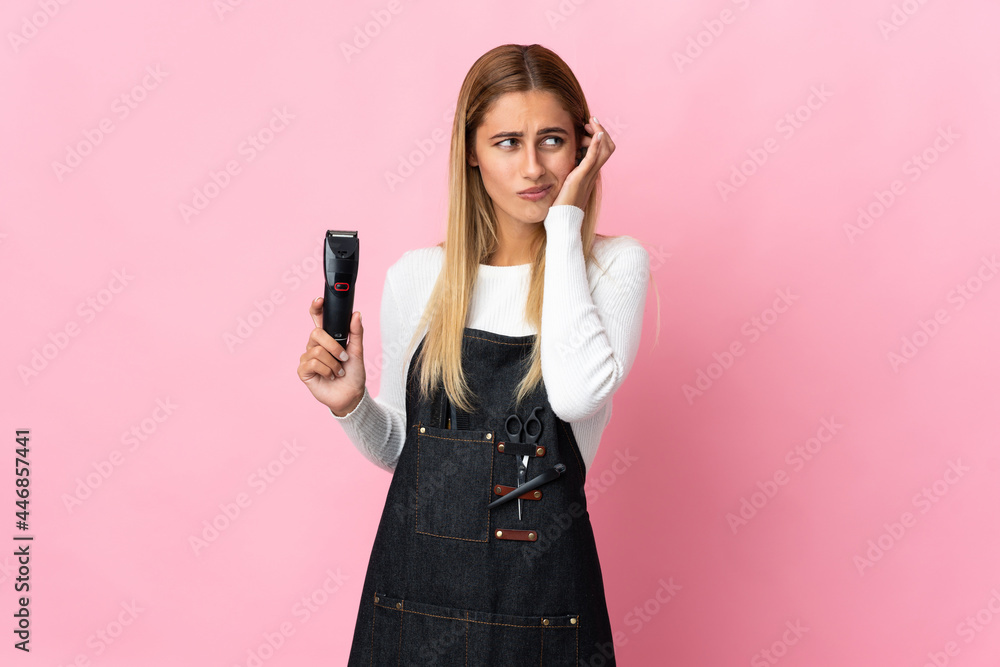 Young hairdresser woman isolated on pink background frustrated and covering ears Young hairdresser woman isolated on pink background frustrated and covering ears