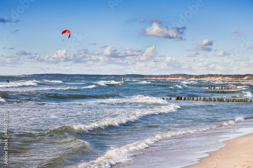 Obraz na płótnie Landscapes of Poland. Windy day at Baltic sea. Kitesurfing near Gdansk. w salonie