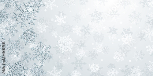 Illustration of big complex translucent Christmas snowflakes in gray colors, located on the left, on background with falling snow