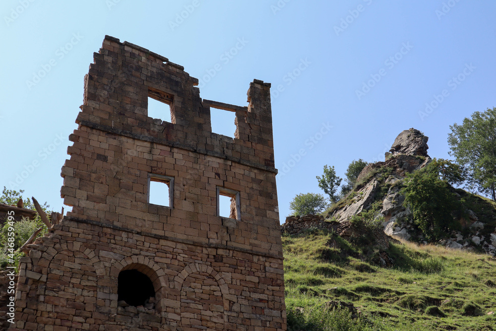 preserved wall with the window in ruined house of abandoned ancient village Gamsutl in the Dagestan, Russia
preserved wall with the window in ruined house of abandoned ancient village Gamsutl in the Dagestan, Russia