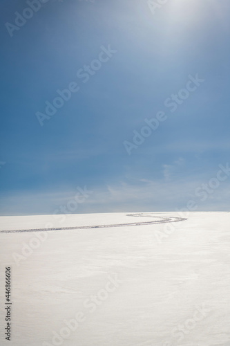 A ski track in the snow