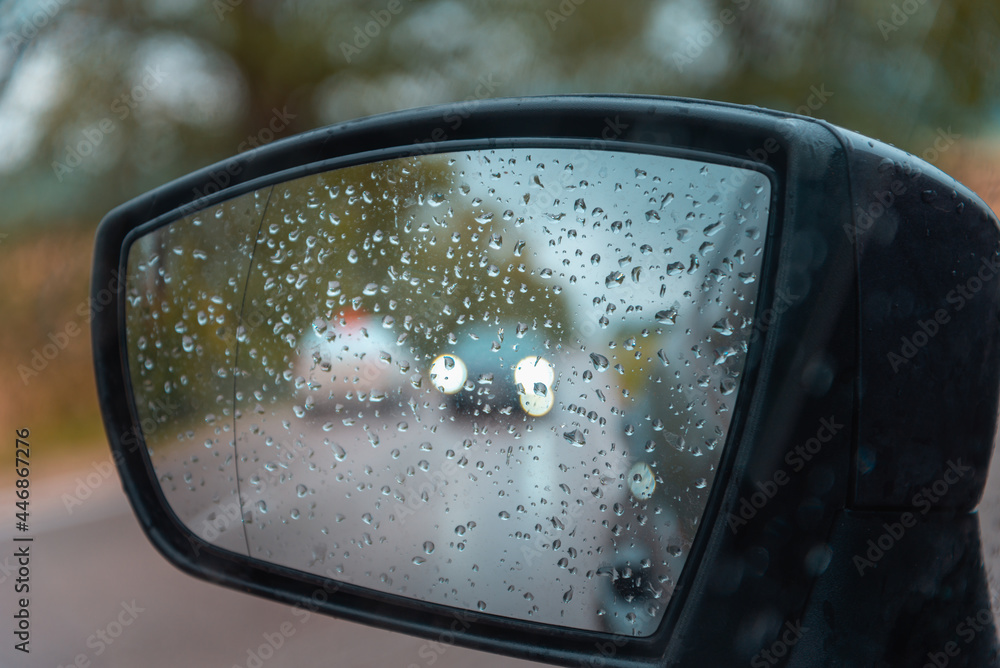 Raindrops on the car mirror. Raindrops on the car mirror.