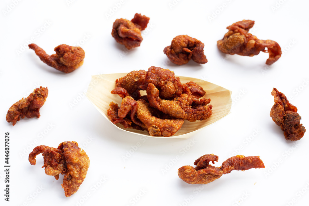 Fototapeta premium Chispy fried chicken skin on white background.